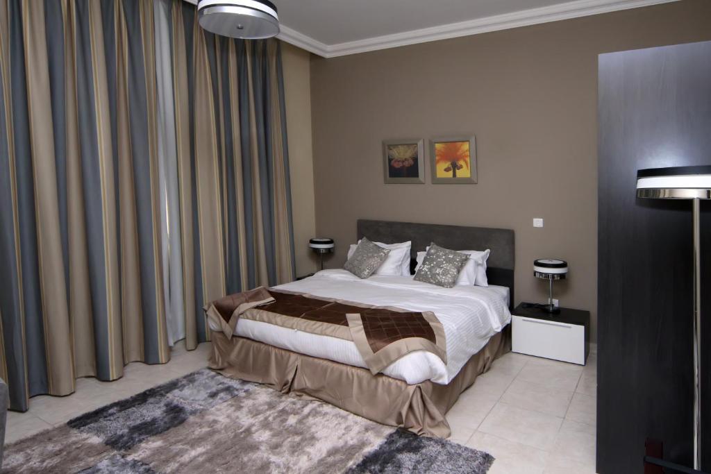 Magnum Hotel & Suites West Bay Doha Rum bild